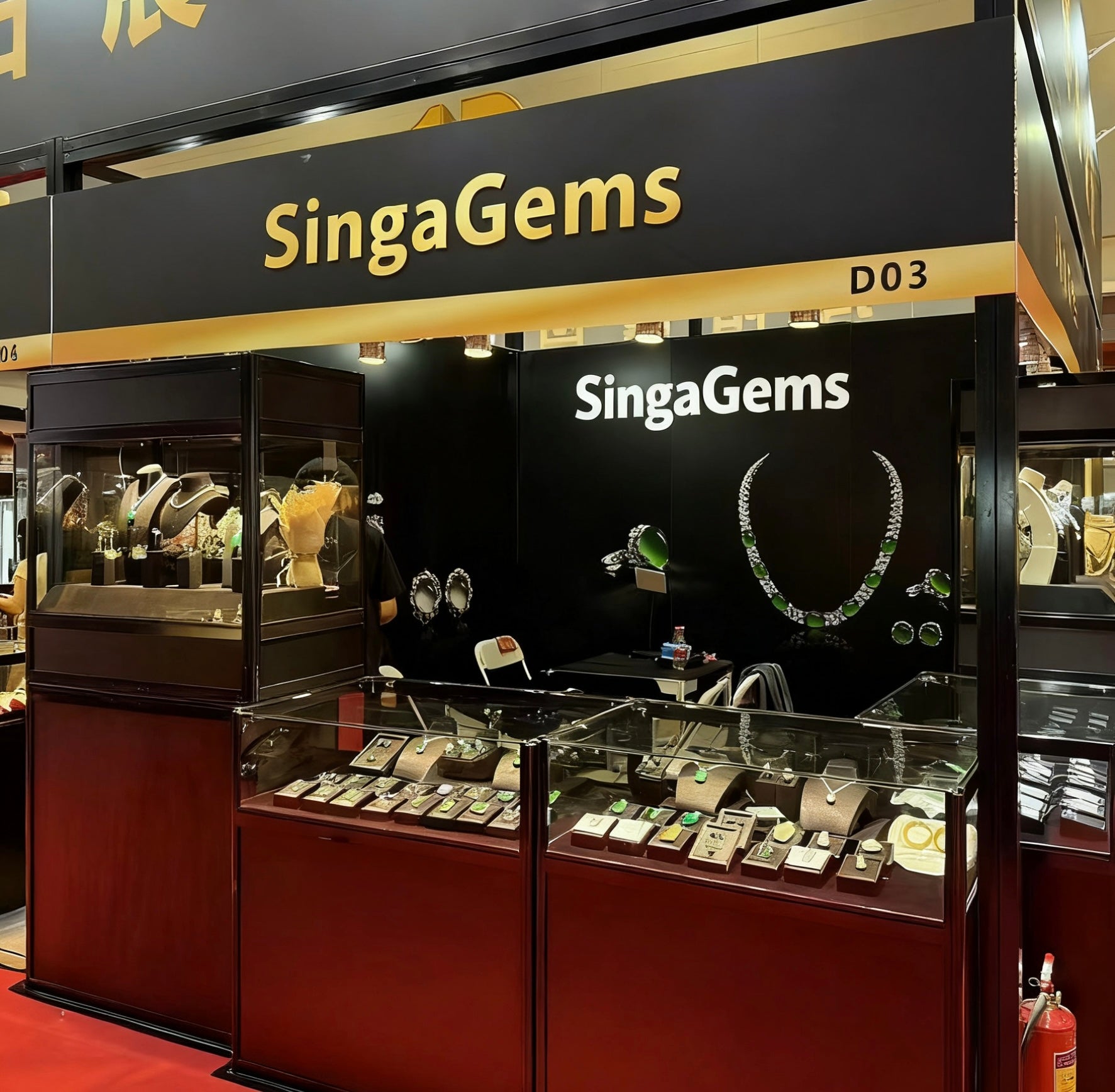 Singa Gems Jewellery exhibition booth showcasing the Verdelune Collection with sterling silver, jadeite, and zircon designs.